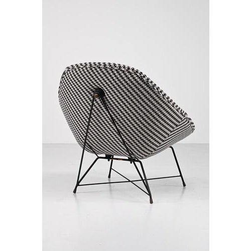 Augusto bozzi lounge chair for saporiti. The foam and fabric of this italian chair have been replaced. The black metal...