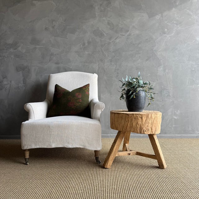 This solid stump slice was turned into a side table or stool. The solid thick top has a beautiful movement with unique...