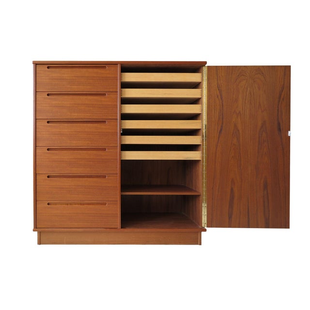 Danish chest of drawers designed by Nils Jonsson for Torring Mobelfabrik. Handcrafted from beautifully grained teak, the...