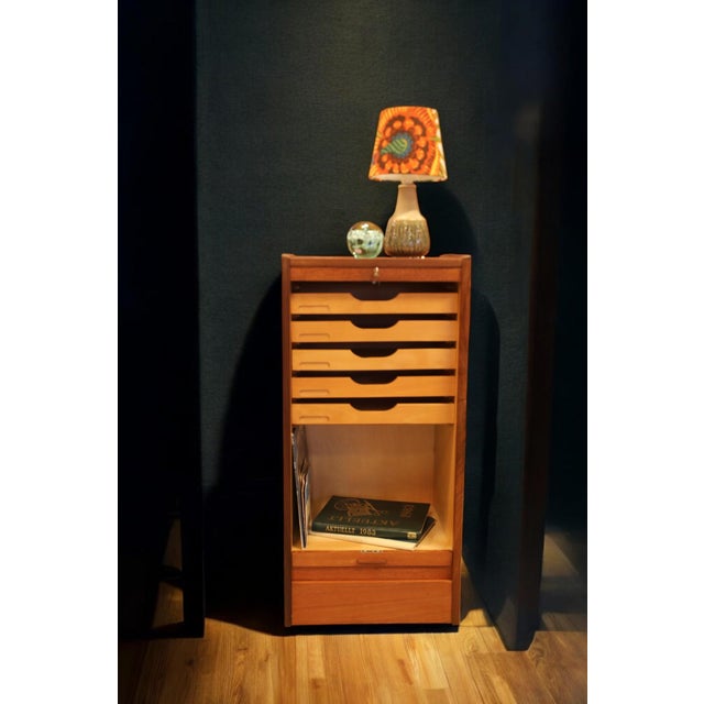Danish teak shutter cabinet with several practical drawers and space for binders, small items and other things. The...