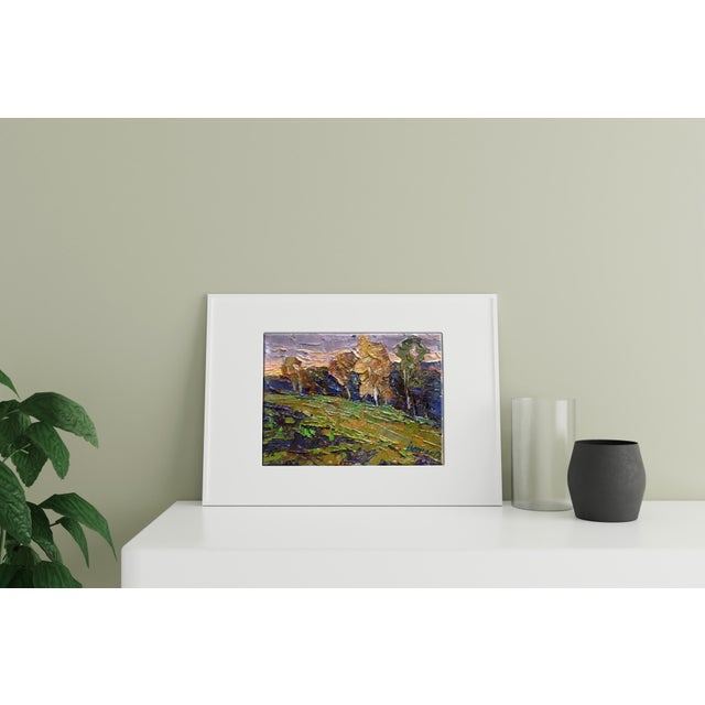 Kalenyuk Oleksiy's painting "Autumn is Cold" portrays the solemn beauty of an autumn landscape transitioning towards the...