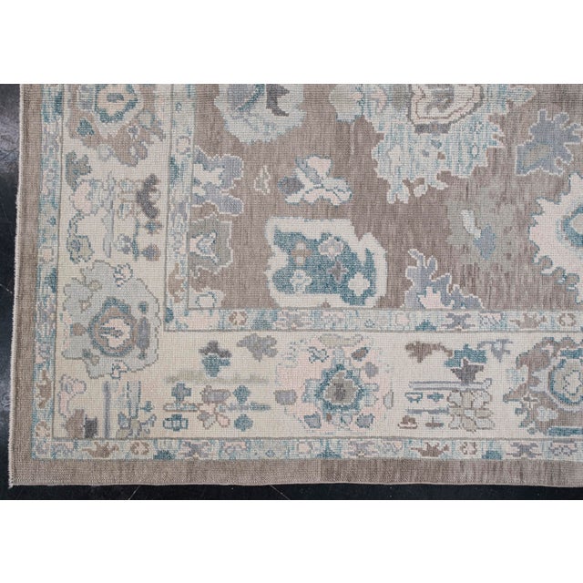 Turkish Oushak Rug Gray & Blue Handwoven Wool Rug 6'2" X 8'8" This exquisite Turkish Oushak rug is a testament to the...
