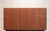 A refined and functional mid-century modern teak cabinet, designed by Kurt Karlsson and produced by August Löfvings...