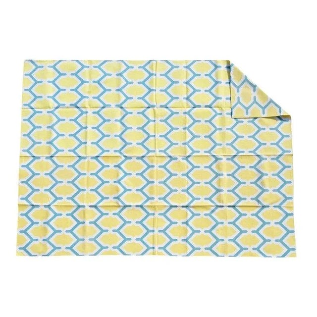 Made from naturally dyed 100% cotton yarn, these dhurrie rugs have been handwoven by skilled craftsmen in Jaipur. The age...