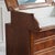 A Louis Philippe washstand, circa 1860, with a hinged top, an integrated mirror, and an inset marble top. The design is...
