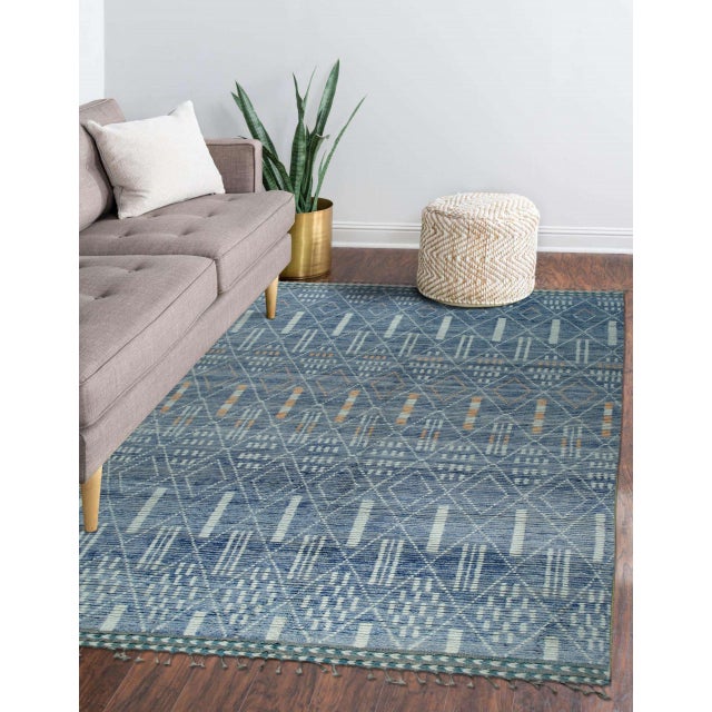 Timeless Marrakech Blue Hand-Knotted Wool Rug, Country of Origin: Pakistan. This striking piece offers a sophisticated...