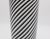 Mezza Filigrana' Murano glass vase by Dino Martens. Clear glass, fused ribbons, white and dark purple, base with fused...