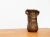 Very heavy bronze vessel. The vessel shows ornamental decorations with traditional designs. This piece has an attribution...