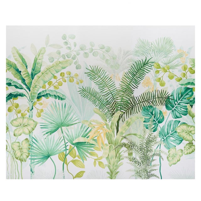 A stylish array of palm fronds, feathery ferns and other tropical foliage enliven this exuberant botanical wallpaper....