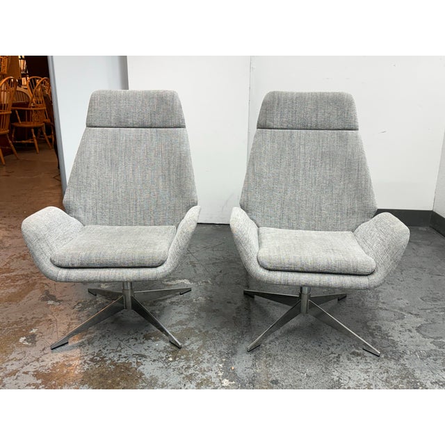 Design Plus Gallery presents a Pair of Conexus High Back Swivel Lounge Chairs by Michael Vanderbyl for HBF. The Conexus...