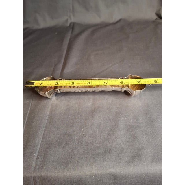 This is an exceptional vintage sterling silver mezuzah case crafted by the world-renowned Israeli silversmith firm...