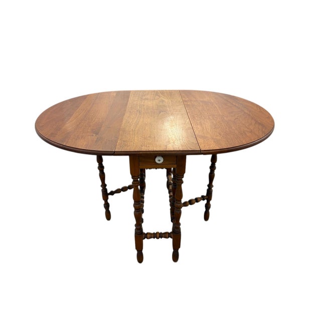 William and Mary Style Drop Leaf Gate Leg Table With Drawer Rectangular shape with leaves down converts to a generous oval...