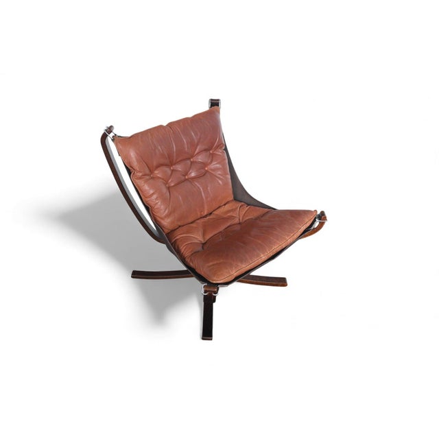 Origin: Norway Designer: Sigurd Ressell Manufacturer: Vatne Møbler Era: 1960s Materials: Leather, Bent Beech Measurements:...