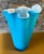 This vintage 16-inch tall hand-blown art glass vase has a handkerchief shape with a wavy lip. The captivating sky blue...