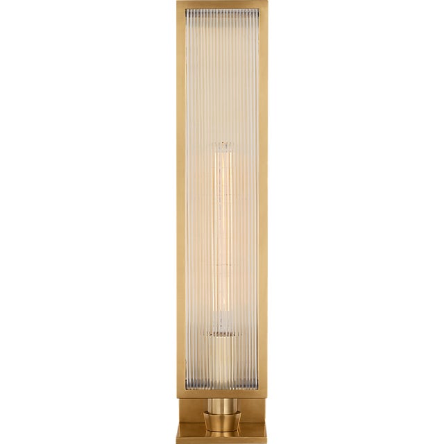 York 24" Single Box Sconce in Soft Brass with Clear Ribbed Glass Designer: Barbara Barry Finish: Soft Brass Height: 24.25"...