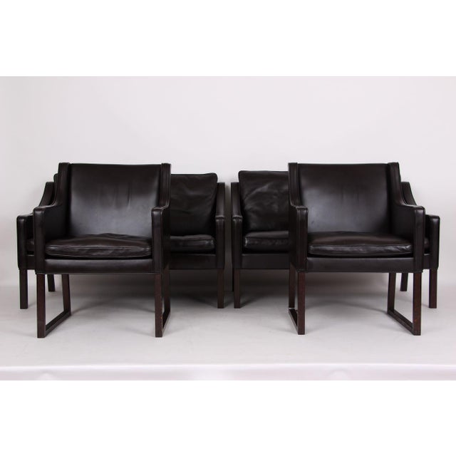 Offered here is an exclusive, original living room set by Børge Mogensen, consisting of two sofas and two armchairs. The...