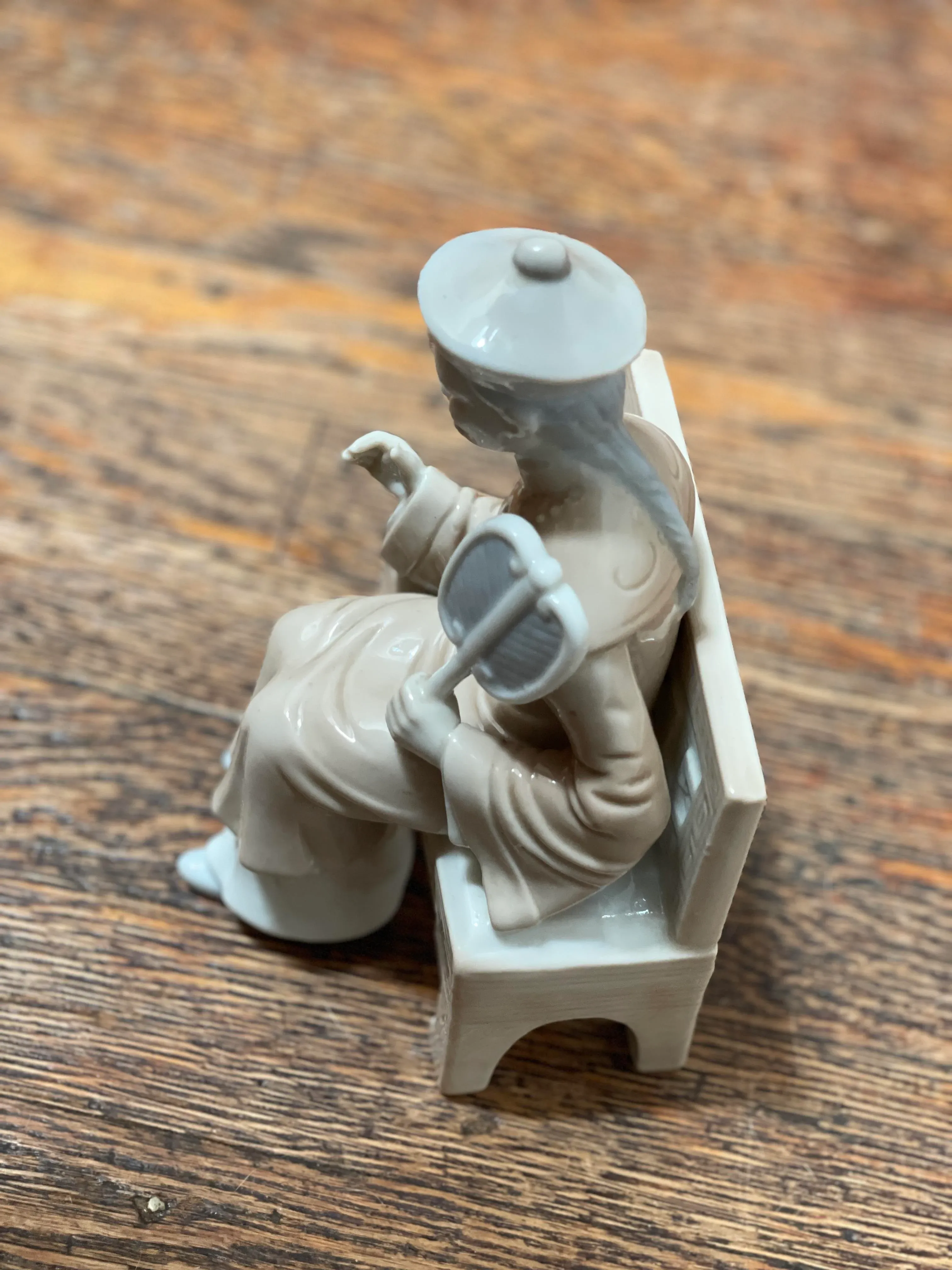 Vintage Ceramic KPM Figure of an Asian Man on a Bench With Hand