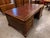 Mid-20th-century mahogany partners executive desk in the Chippendale style, dating to circa 1950s and designed to...