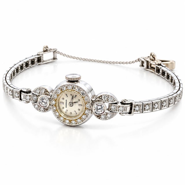 An exquisite statement of vintage grace and mid-century feminine allure, this antique Perraux cocktail watch is...