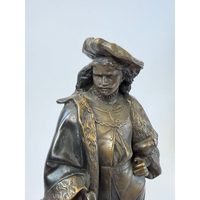 This 18-inch bronze sculpture serves as a tribute to the legendary Dutch master, Rembrandt van Rijn. Renowned for his...