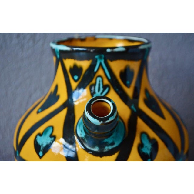 Pretty rounded shapes, bright and fresh colors, this pretty water pitcher called "gargoulette" will not fail to bring its...