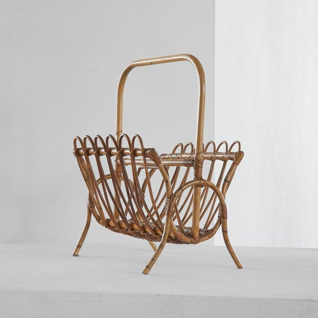Wonderful and stylish magazine rack in bamboo from the 1960s. Probably Italian. Great shapes, proportions and use of...