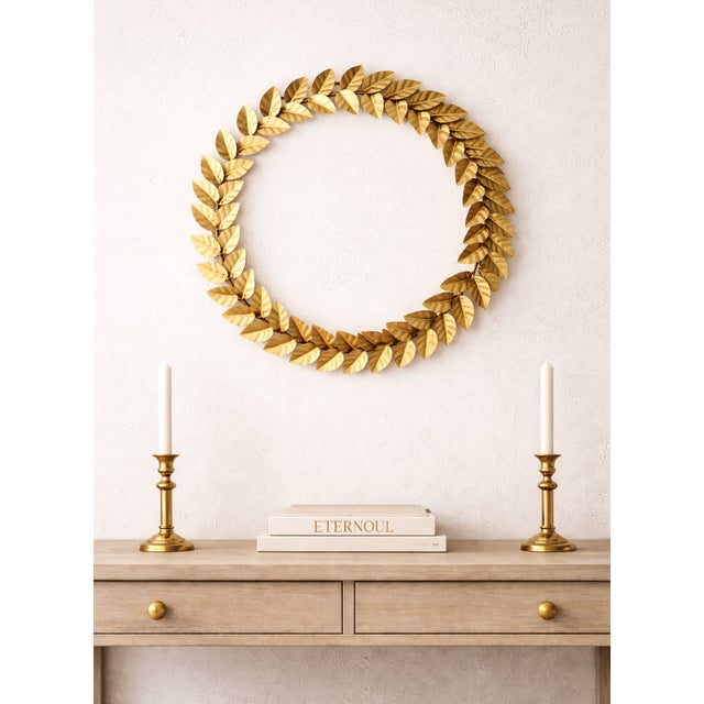 Crown your space with the timeless elegance of this grand metallic leaf wreath, a classic symbol of peace, honor, and...