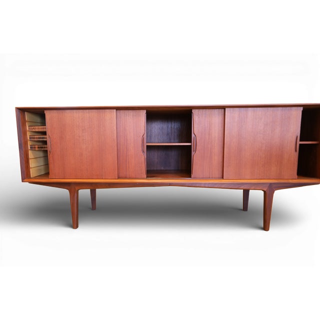 An incredibly elegant and stylish sideboard with all the typical details that the Danes were masters of! The sideboard is...