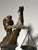 Impressive bronze sculpture depicting Lady Justice, blindfolded and holding scales and a sword. Her flowing robes and...