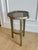 The Caracole Modern Edge "Contour" Side Table combines luxurious materials with an organic silhouette to create a...