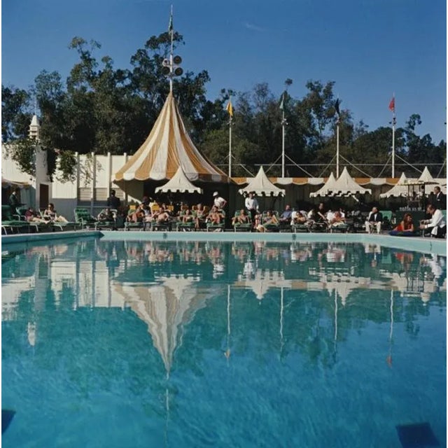 Beverly Hills Hotel 1957 by Slim Aarons Slim Aarons Limited Estate Edition Holiday makers relaxing by the pool at the...