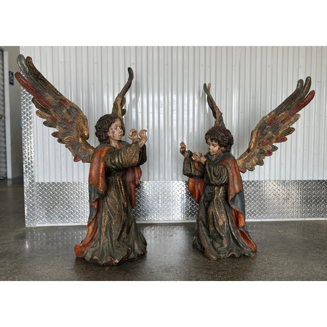 Large Continental Hand Carved Wood Angels most likely Italian sold as found missing their instruments with fading to...