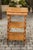 A French burl walnut tiered trolley from the late 19th century, with butterfly veneer, single drawer, turned legs and...