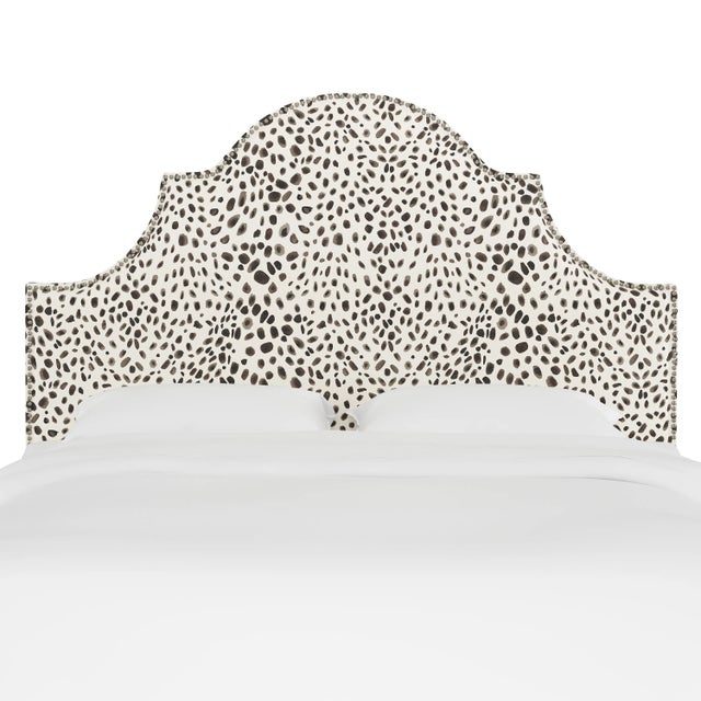 Classic curves wrapped in smooth upholstery, then accented with elegant ornamental nailheads, gives this Upholstered...