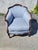 The 1930 Club Living Room Chair is a fully assembled, antique chair in a solid sky blue color. This indoor chair,...