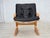 1970s, Norwegian design. Armchair model "Kengu". Original black leather with patina, bent wood, canvas. Original good...