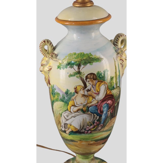 Stunning Vintage Italian Faience hand painted pottery in a figural pastoral scene, snake handle. Good condition, new...