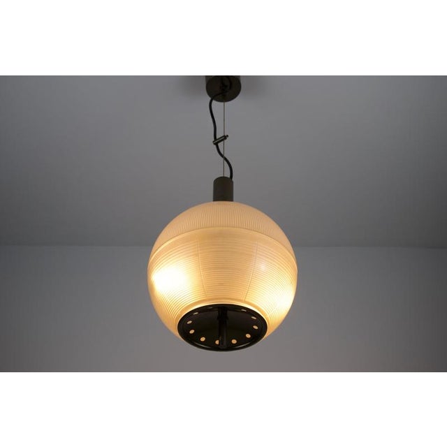 Italian pendant lamp from the 1960s, attributed to ignazio gardella. the design centres around a large, softly rounded...
