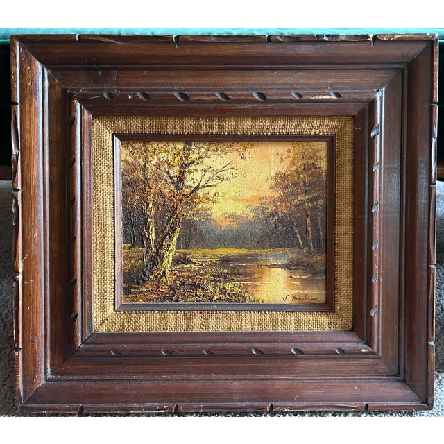 Vintage impressionist autumn woodland landscape oil painting in vintage wood frame. Signed to the lower right ‘J. Medina’....