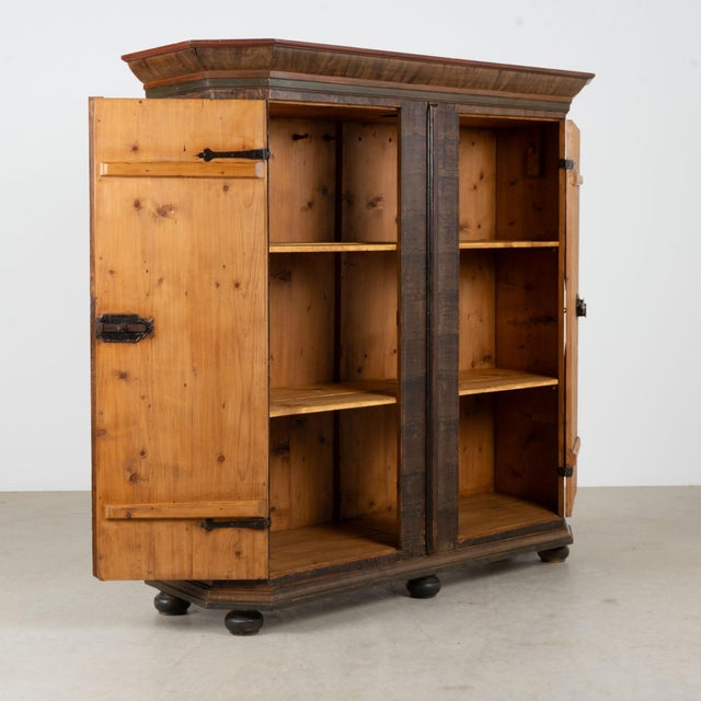 Large two-door pine armoire dated 1793, retaining its original hand-painted folk art decoration and more than two...