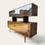 Elegant credenza and top hutch designed and manufactured by Peter Løvig Nielsen in Denmark. Featuring a brazilian rose...