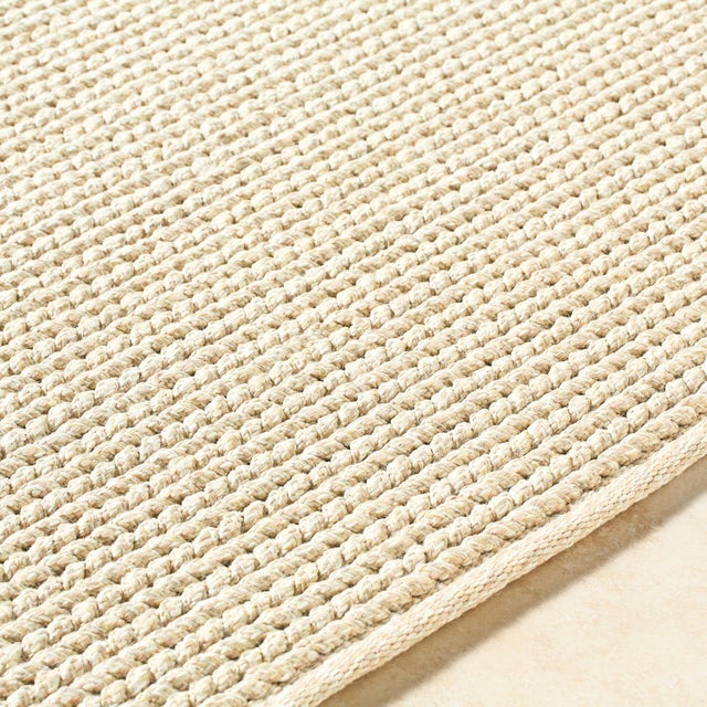 Add a touch of coastal charm to your home with the Beach House Hand Made Rug. Expertly hand woven in India, this rug is...