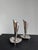 Beautiful pair of Danish Modern silverplate candlesticks By Hans Jensen Denmark, 1960s Each measures: 2.5"W x 2.5"D x 4.5"H.