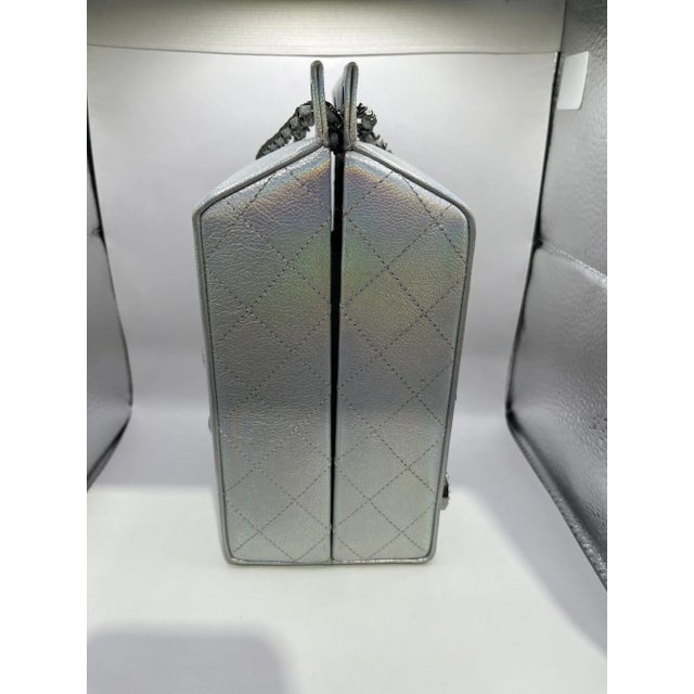 An incredibly rare and limited edition find from the Fall 2014 runway collection, this Chanel milk carton bag is crafted...