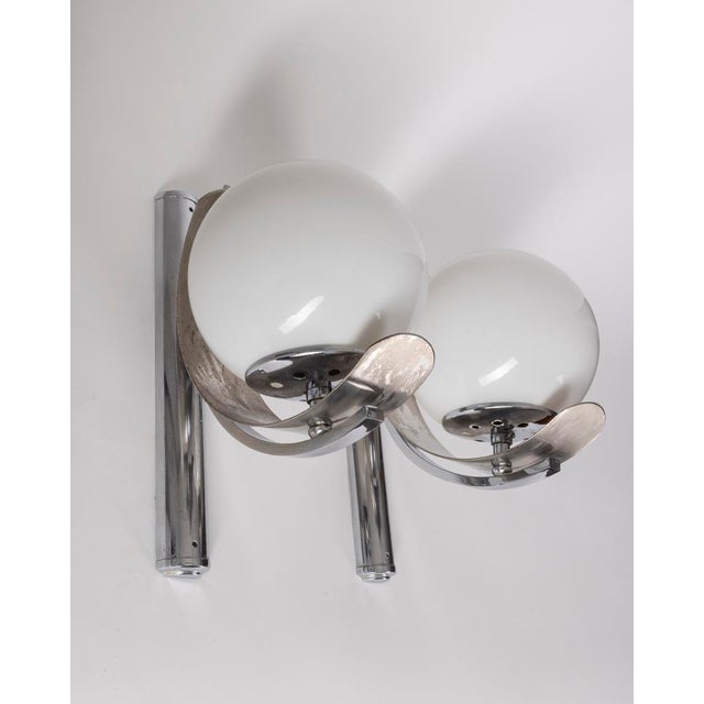Pair of wall lamps with chromed metal structure and white glass lampshades, Italian design, 1980s. Up to 250V (Europe/UK...