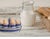 Circa 1880 English Willow pattern porcelain egg cup set including six pedestal egg cups and matching handled stand....