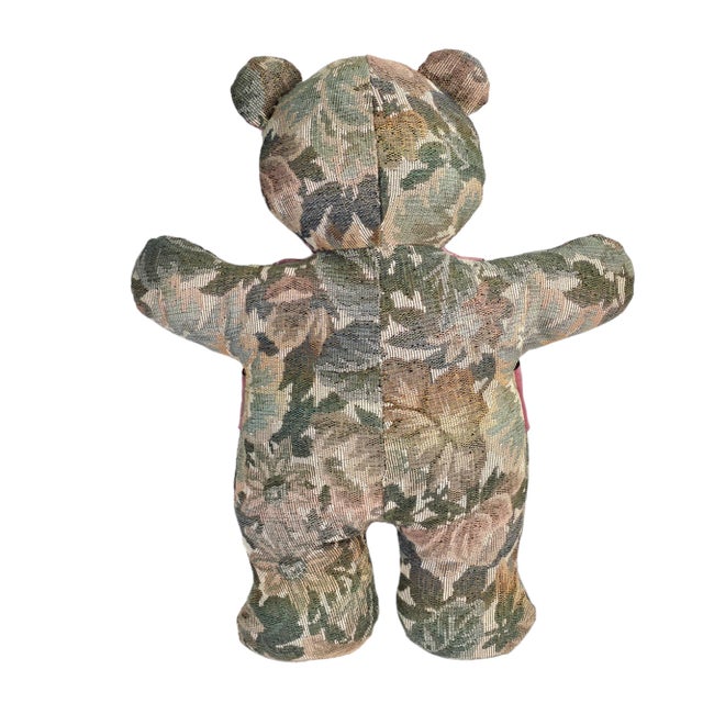 This vintage stuffed animal toy features a bear with a floral design. It is made from moiré tapestry and comes in a color...