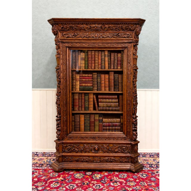 Beautifully Carved Antique French Oak Renaissance Revival Bookcase with Concealed Side Doors~~c. 1880s Exquisitely carved...