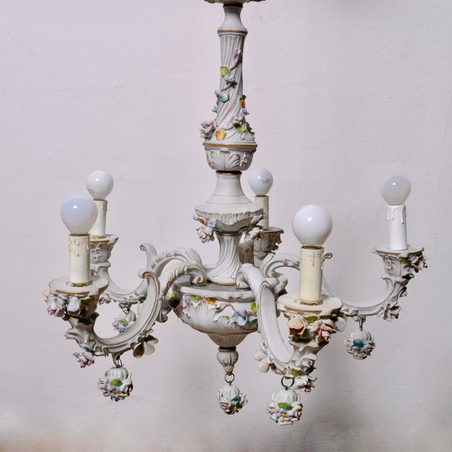 Beautiful five-arm Capodimonte ceramic candlestick, with delicate and elegant floral decorations, in pastel tones. Up to...