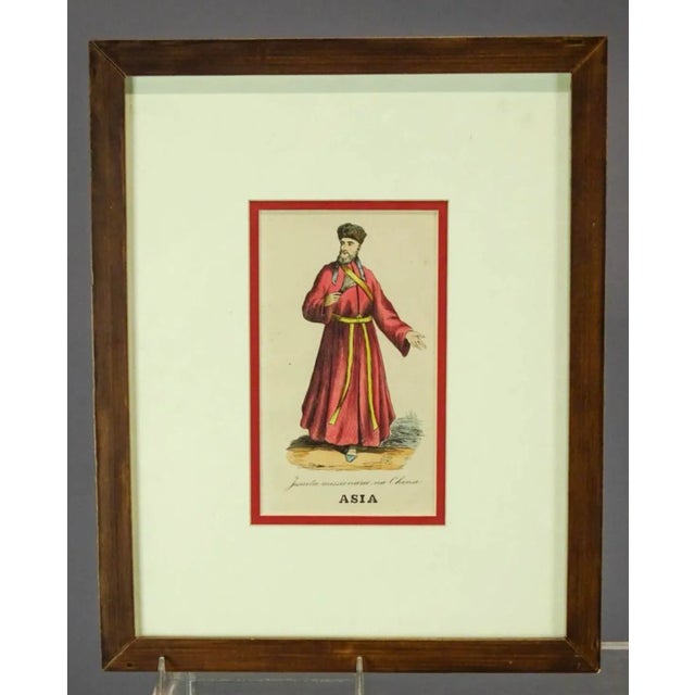A very triptych of three chinoiseries prints in reds and blues